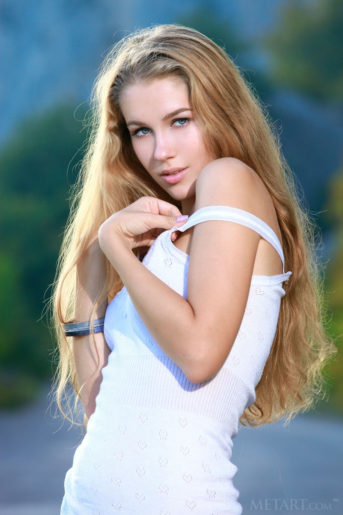 Genevieve Gandi - Blonde goes for a walk in shorts but undresses very soon